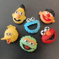 Zes verschillende magneten met de Sesamstraat figuren Bert, Ernie, Cookiemonster, Pino en Groover